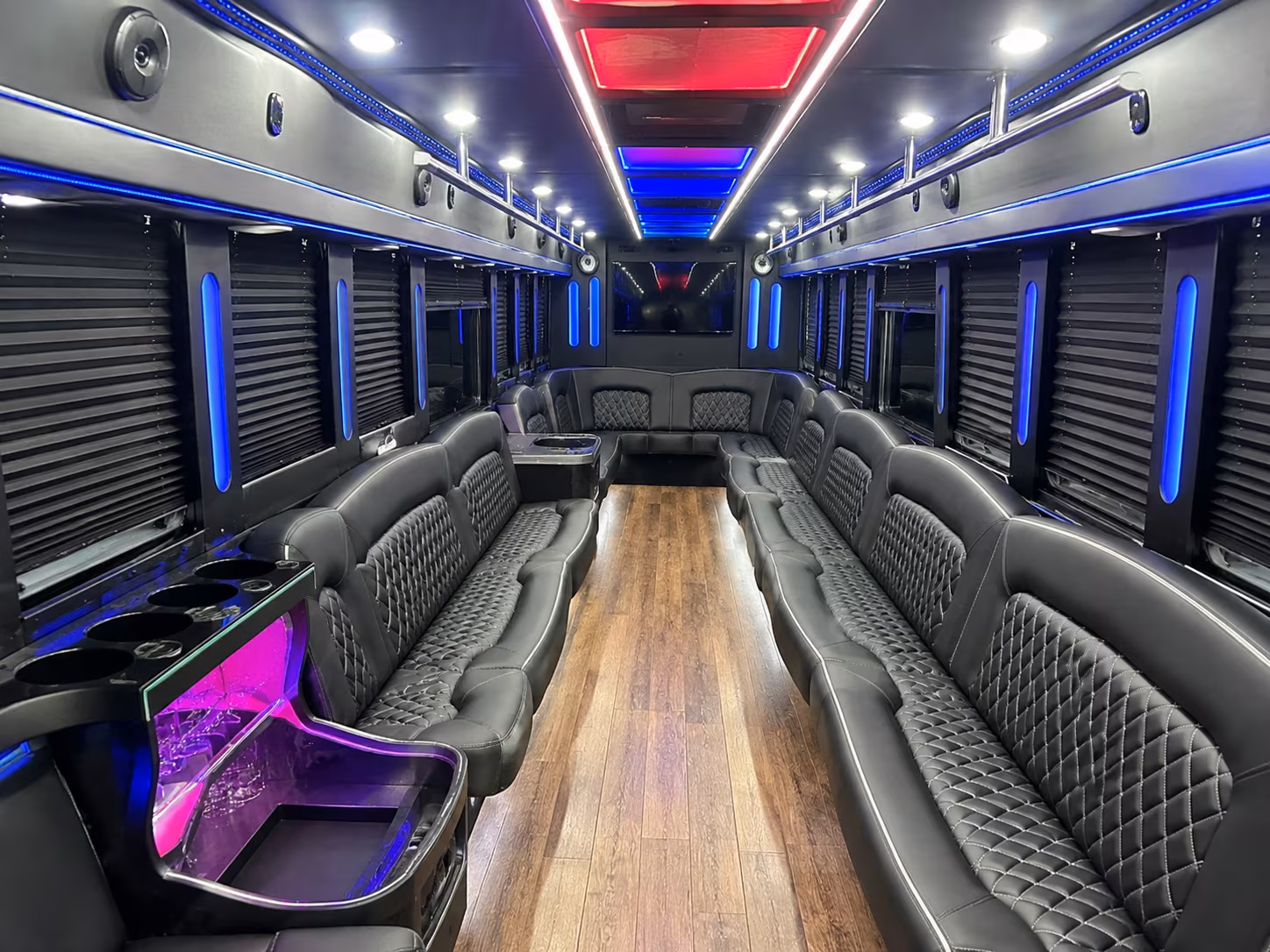 Group beside a Mercedes Sprinter limo in Wichita
